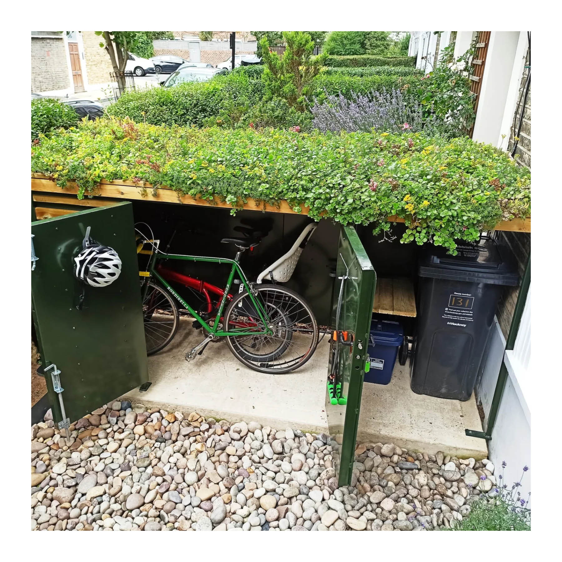 A well-designed combined bike and bin store with a green roof located at the front of the property. ([Atlanticbike](https://atlanticbike.co.uk/)