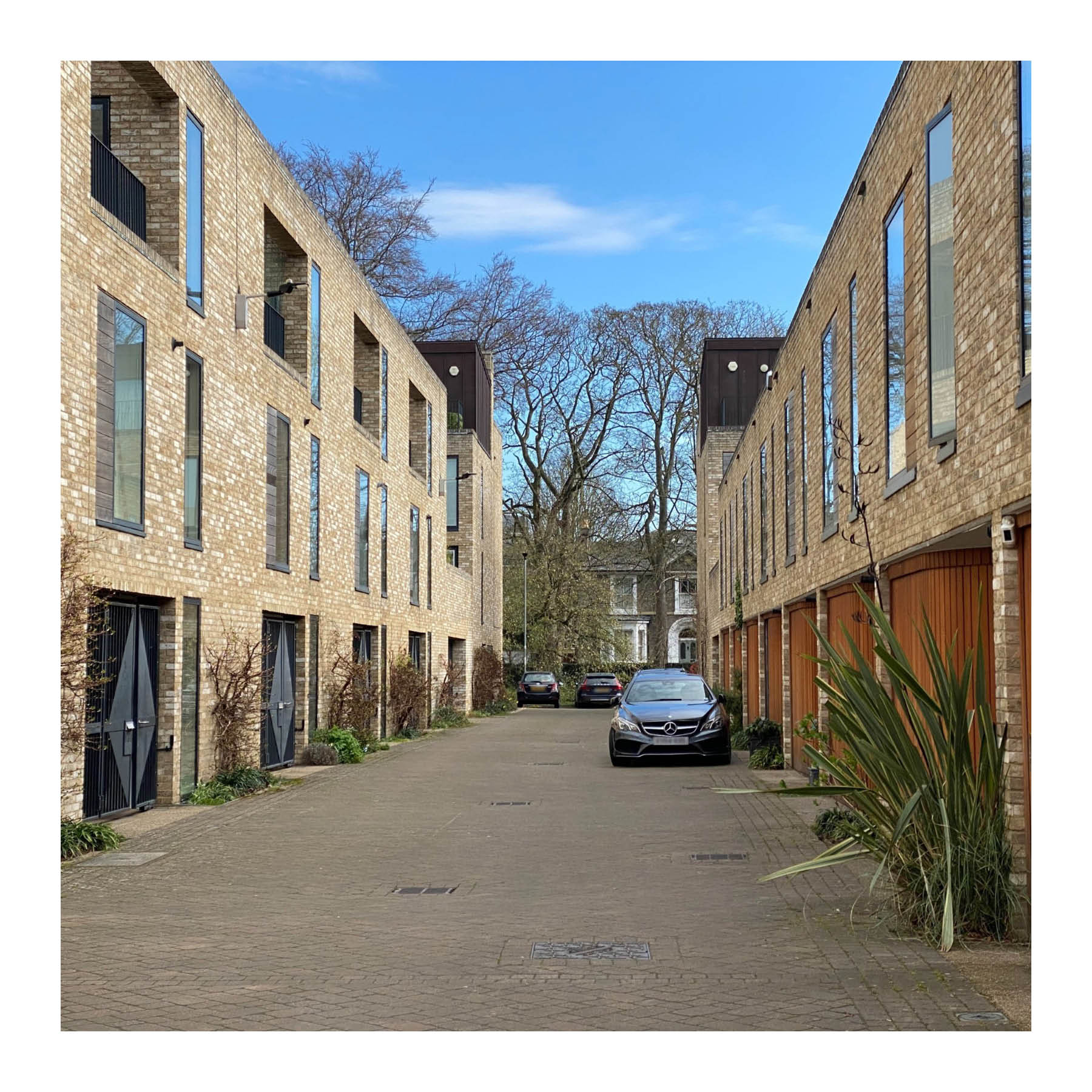 Accordia, Cambridge - an example of a Town Mews. Note the garages.