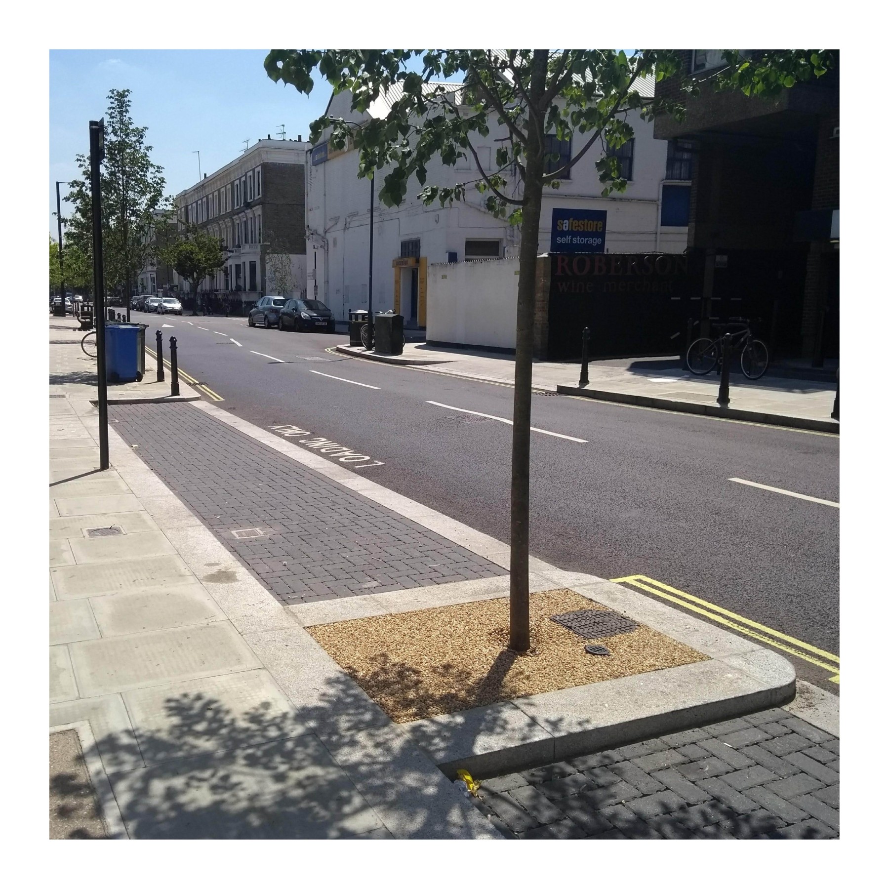 Example of an impermeable carriageway draining to permeable parking bays (Hammersmith & Fulham Council)