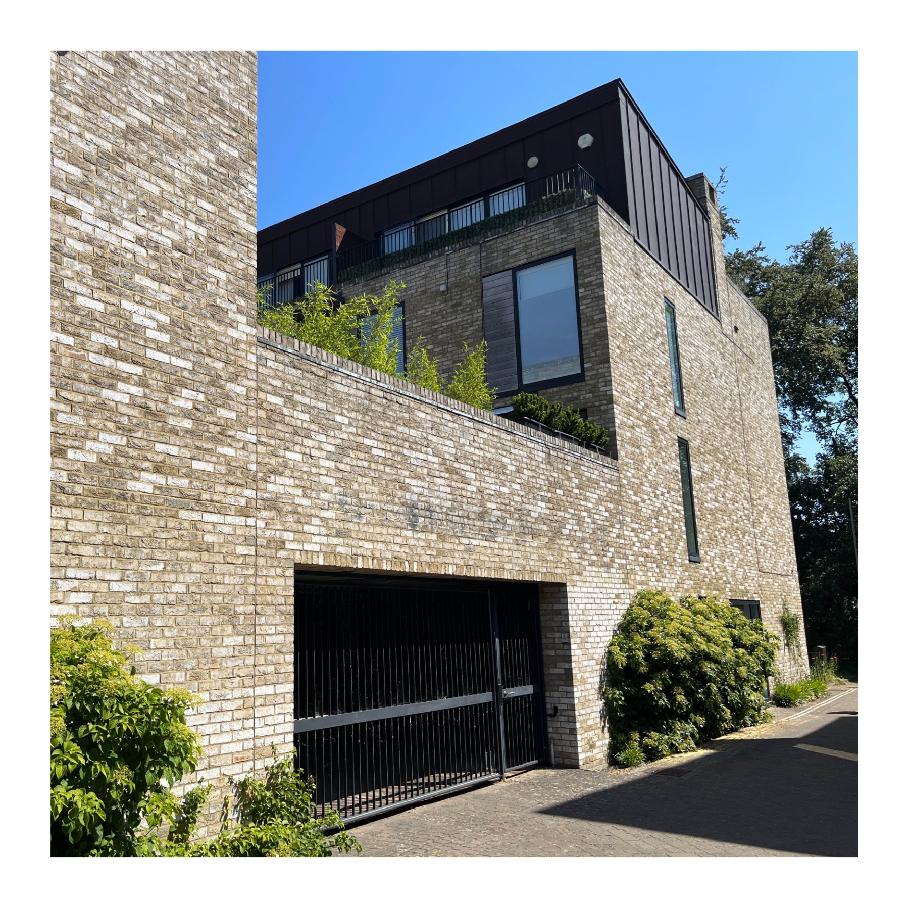 Well-integrated entrance to undercroft parking in Accordia, Cambridge.